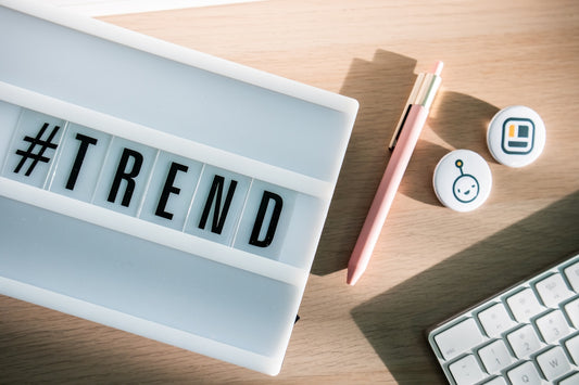 a keyboard with the word trend spelled on it